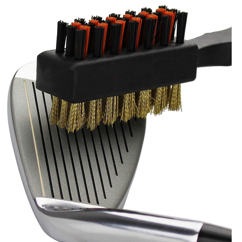 Golf Club Groove Brush cleaning the grooves of an iron club face