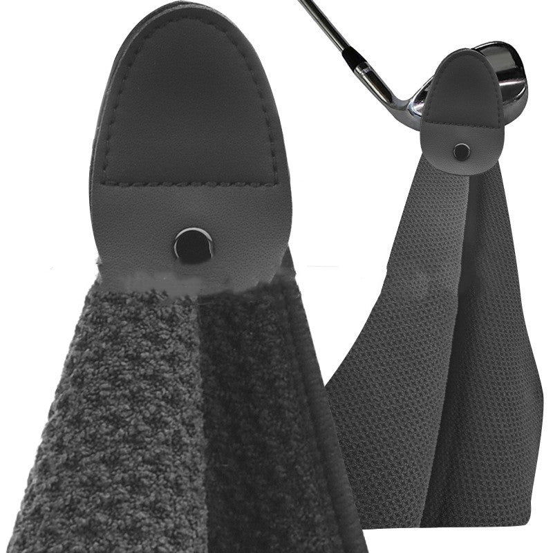 Golf Microfiber Waffle Towel in black with snap-tab hanger hooked over a club